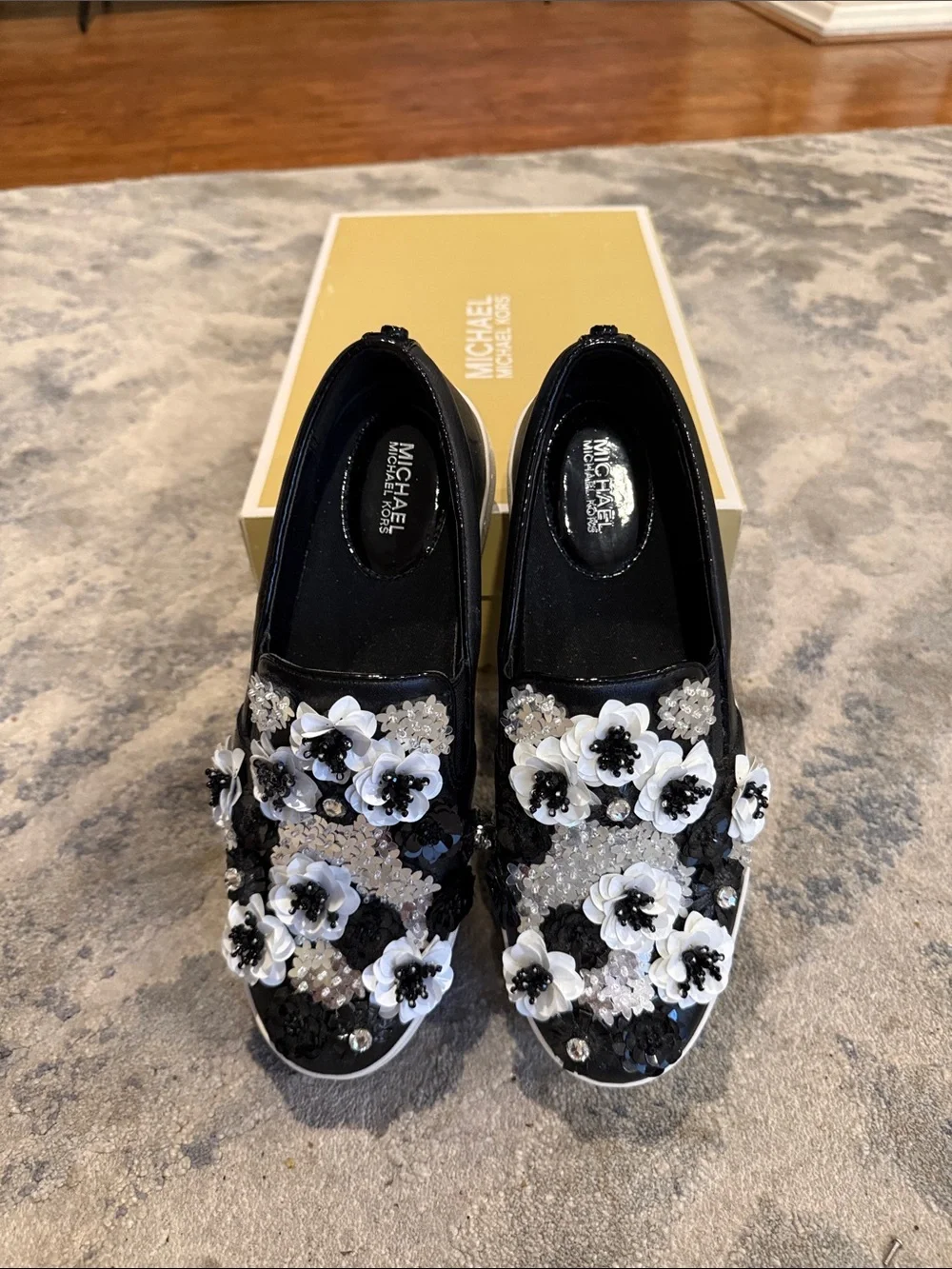 Michael Kors Black and White Floral Embellished Slip-On Sneakers - Picture 2 of 6